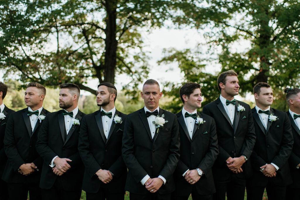 Groom and groomsmen photos from a fall Catholic South Bend, Indiana wedding