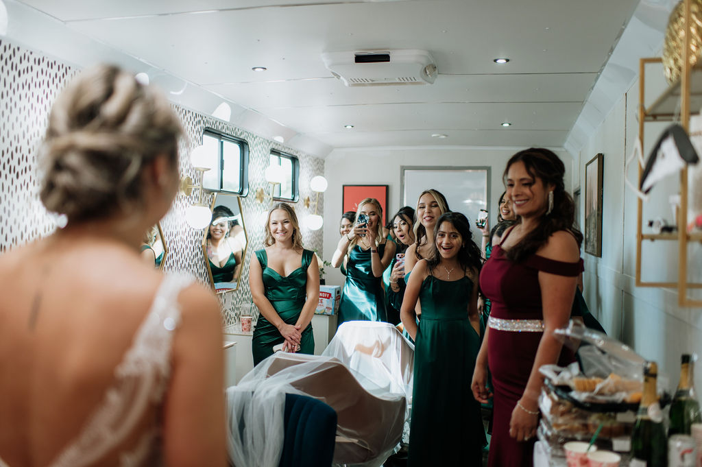 Brides first look with her bridesmaids