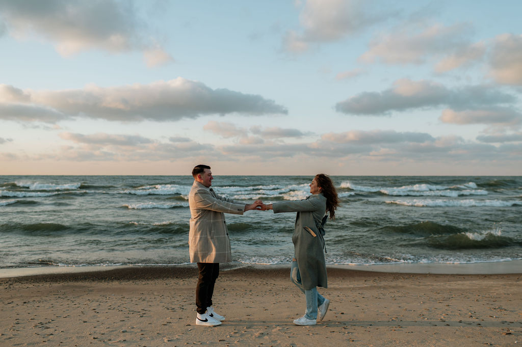 Couples Michigan engagement photos on New Buffalo Beach