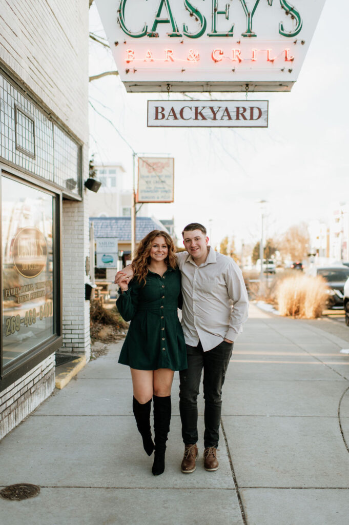 Couples downtown Michigan engagement photos in New Buffalo