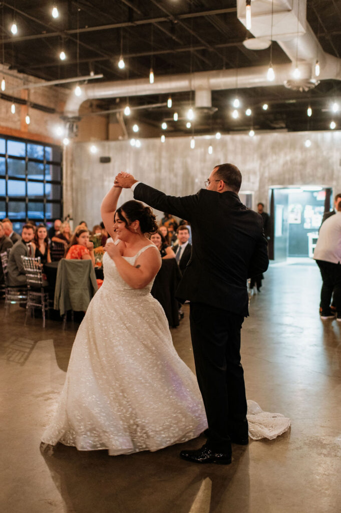 Bride and groom dancing during their reception at The Brick in South Bend, Indiana