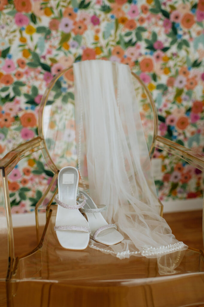 Brides heels and wedding veil 