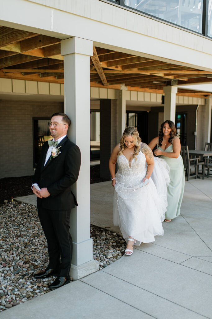 Bride and groom about to share private vows and first touches from their Morris Park Country Club wedding in South Bend, Indiana