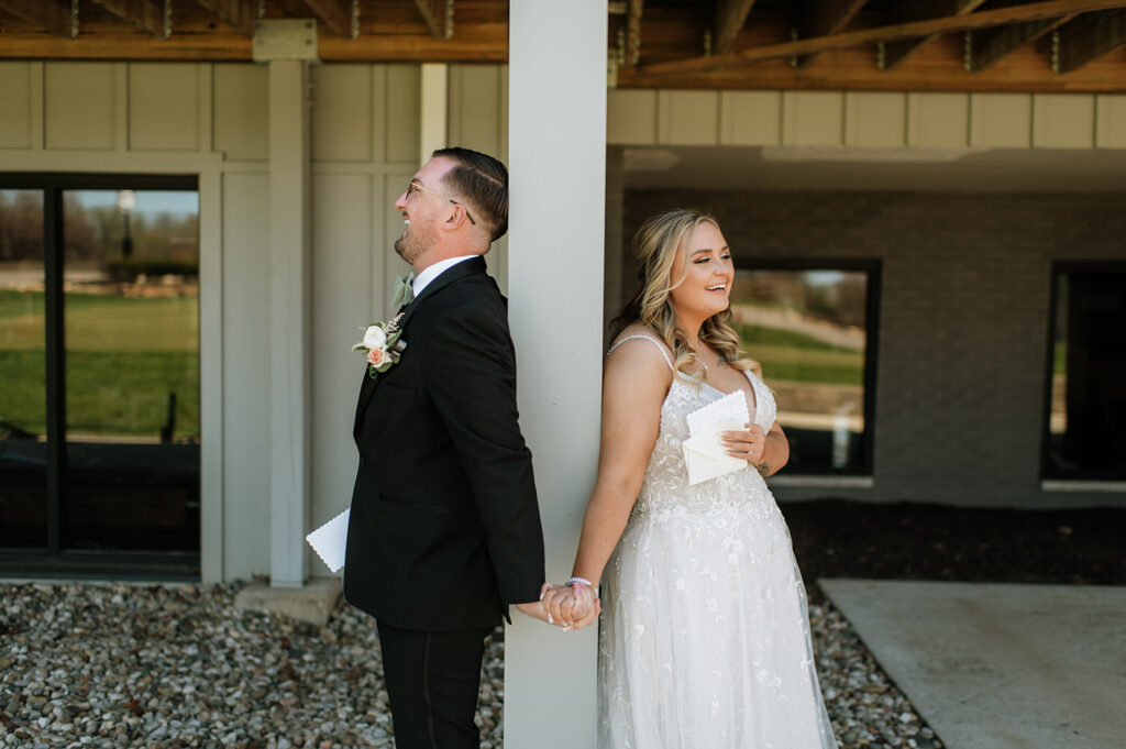 Bride and groom exchanging private vows from their Morris Park Country Club wedding in South Bend, Indiana