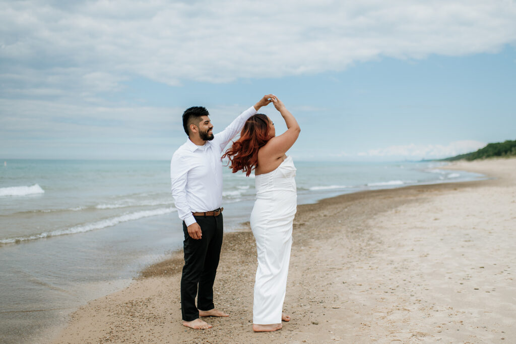 Bride and groom dancing on the beach in Indiana Dunes National Park