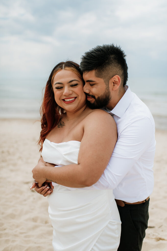 Groom hugging his bride from behind during their elopement in Indiana