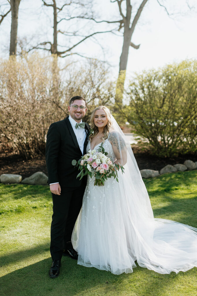 Bride and grooms outdoor portraits from their Morris Park County Club wedding in South Bend, Indiana