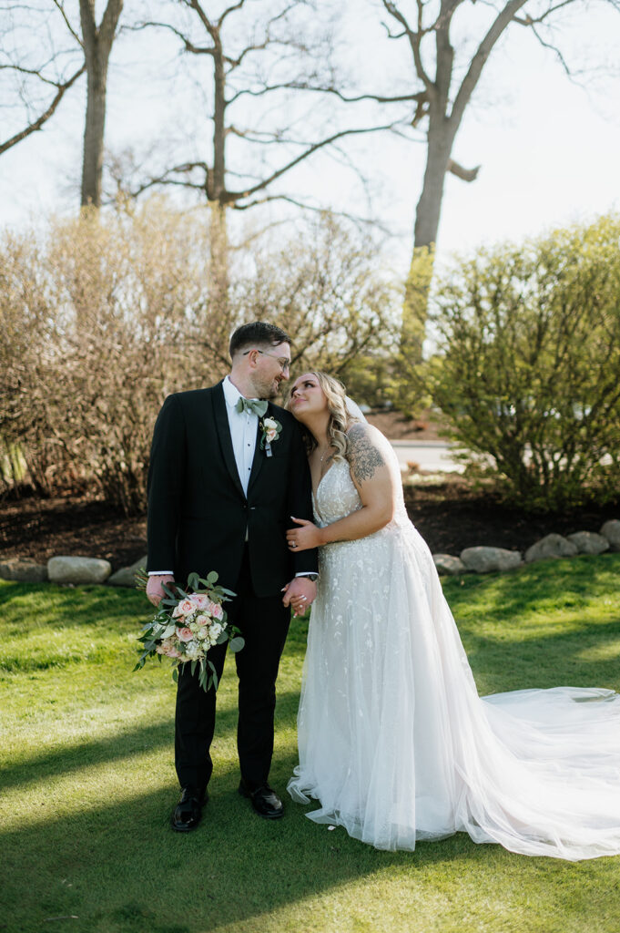 Bride and grooms outdoor portraits from their Morris Park County Club wedding in South Bend, Indiana