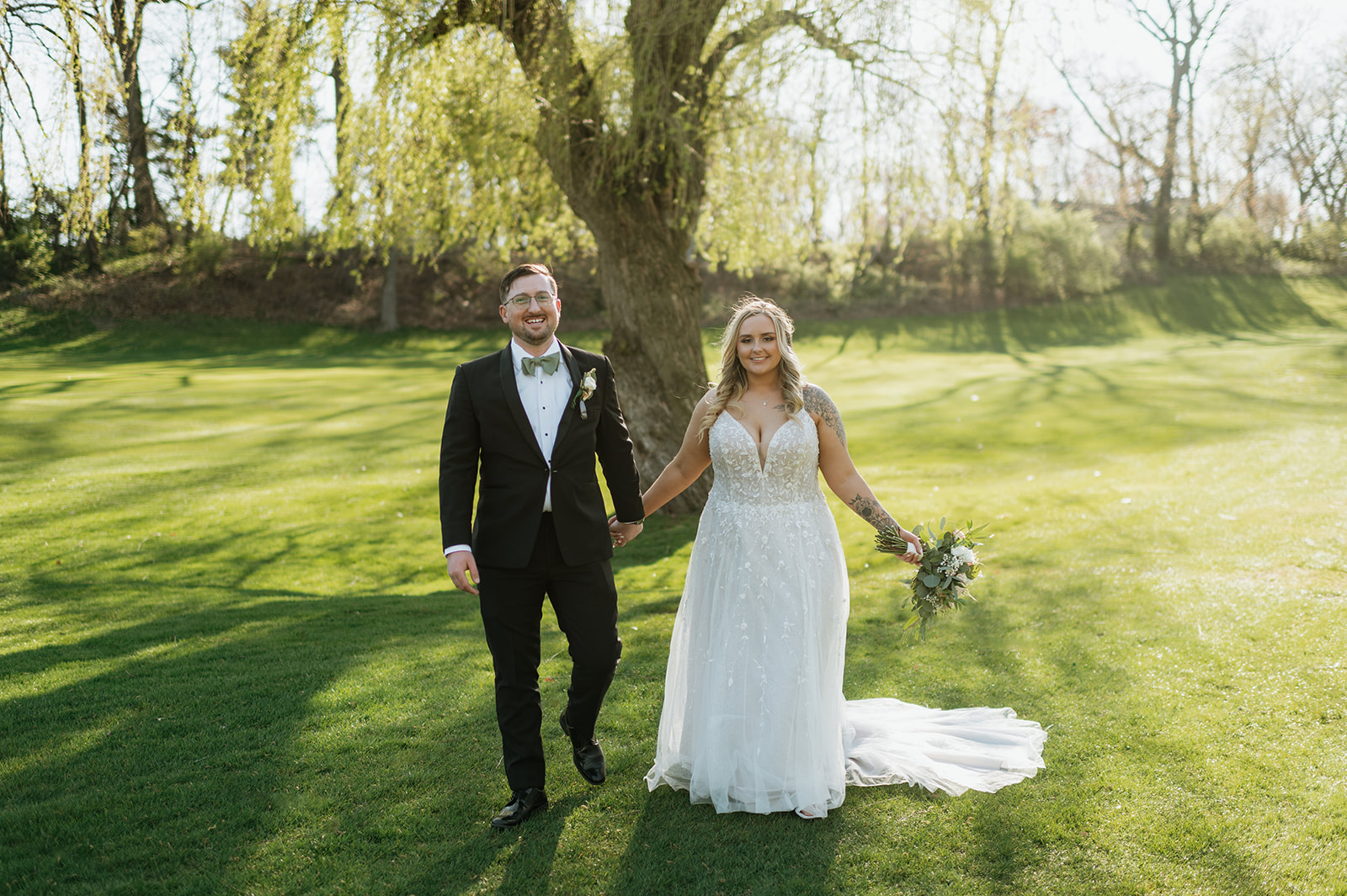 Bride and grooms outdoor portraits from their Morris Park County Club wedding in South Bend, Indiana