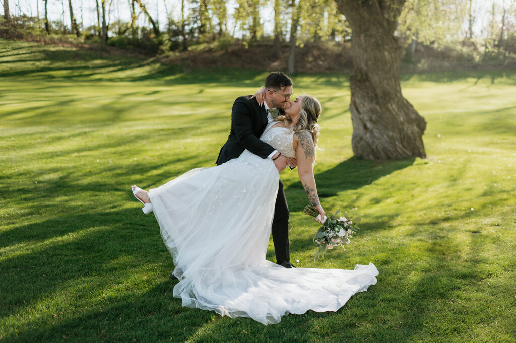 Bride and grooms outdoor portraits from their Morris Park County Club wedding in South Bend, Indiana