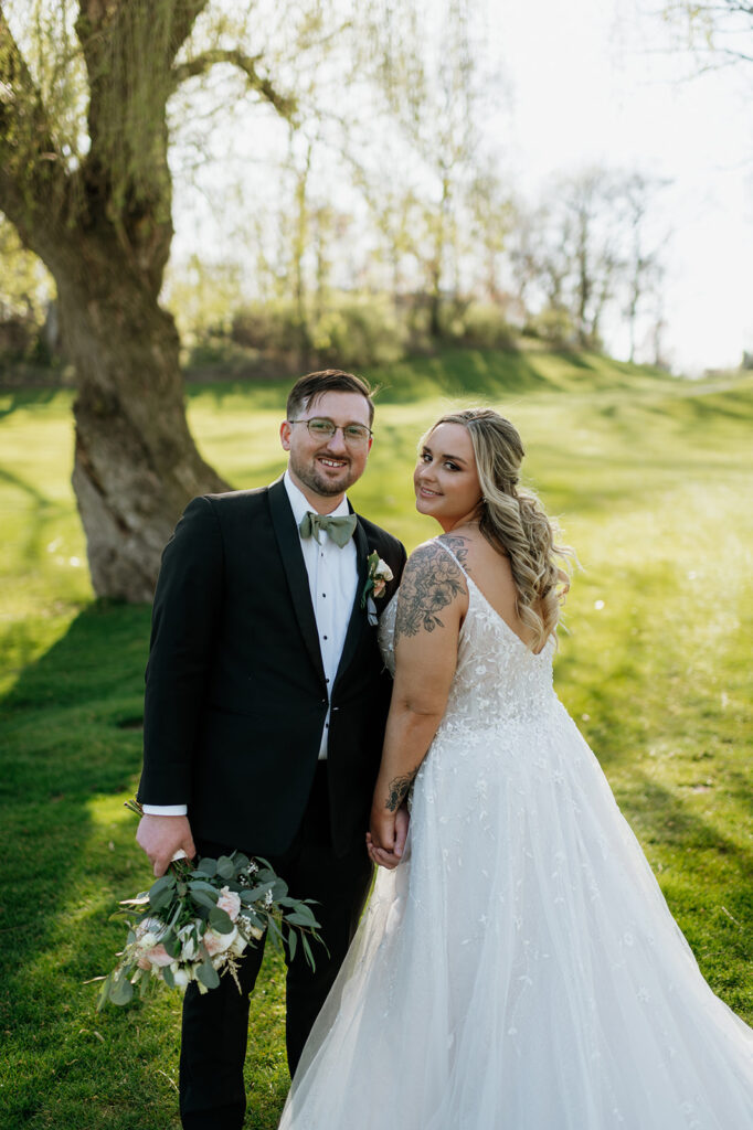 Bride and grooms outdoor portraits from their Morris Park County Club wedding in South Bend, Indiana