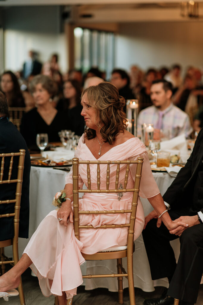 Mother of the groom crying during the reception