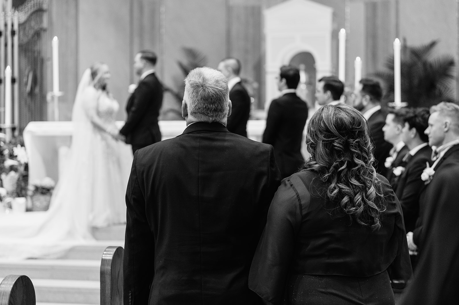 Black and white photo of a Catholic wedding ceremony at St. Pius X Catholic Church in Granger, Indiana