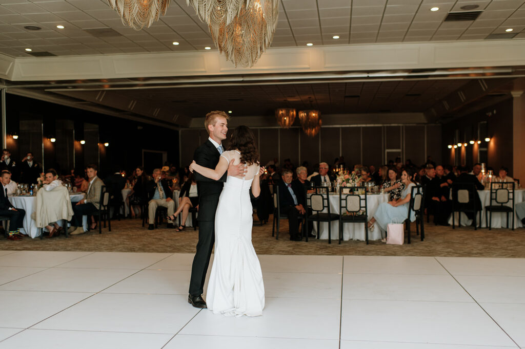 Bride and grooms first dance during their Ritz Charles Carmel, Indiana wedding reception in the Ginkgo Ballroom