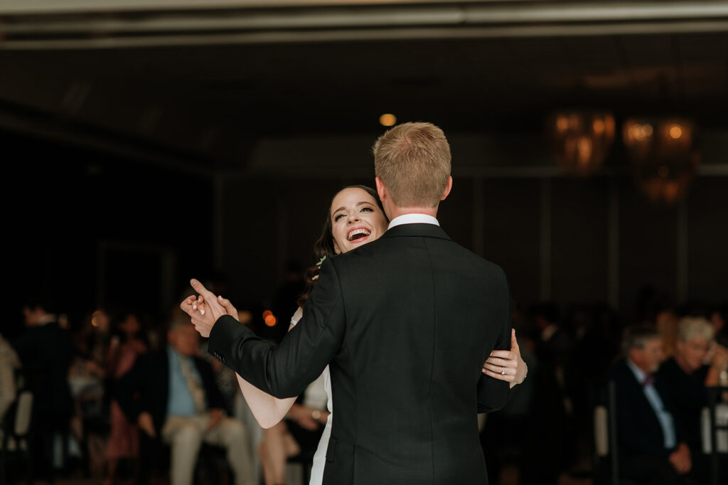 Bride and grooms first dance during their Ritz Charles Carmel, Indiana wedding reception in the Ginkgo Ballroom