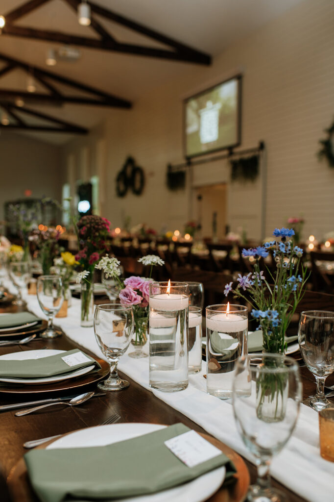 Colorful wildflower indoor wedding reception at The Wooded Knot in Tippecanoe, Indiana