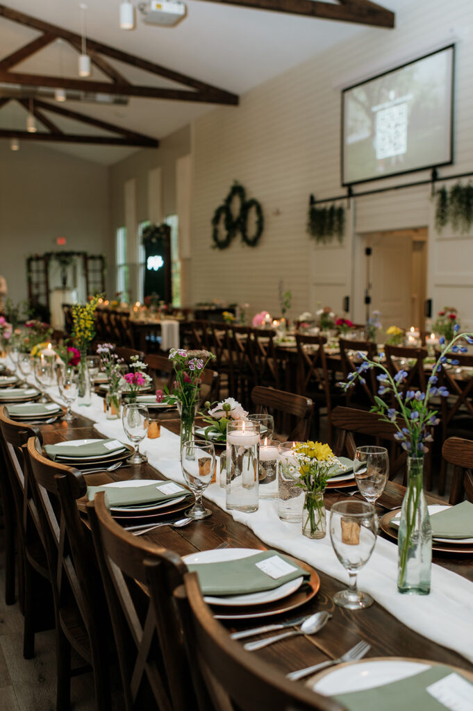 An indoor wildflower wedding reception at The Wooded Knot in Tippecanoe, Indiana