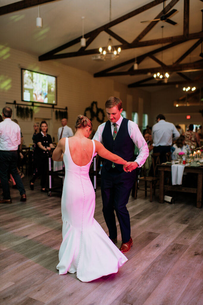 Bride and groom dancing during their reception