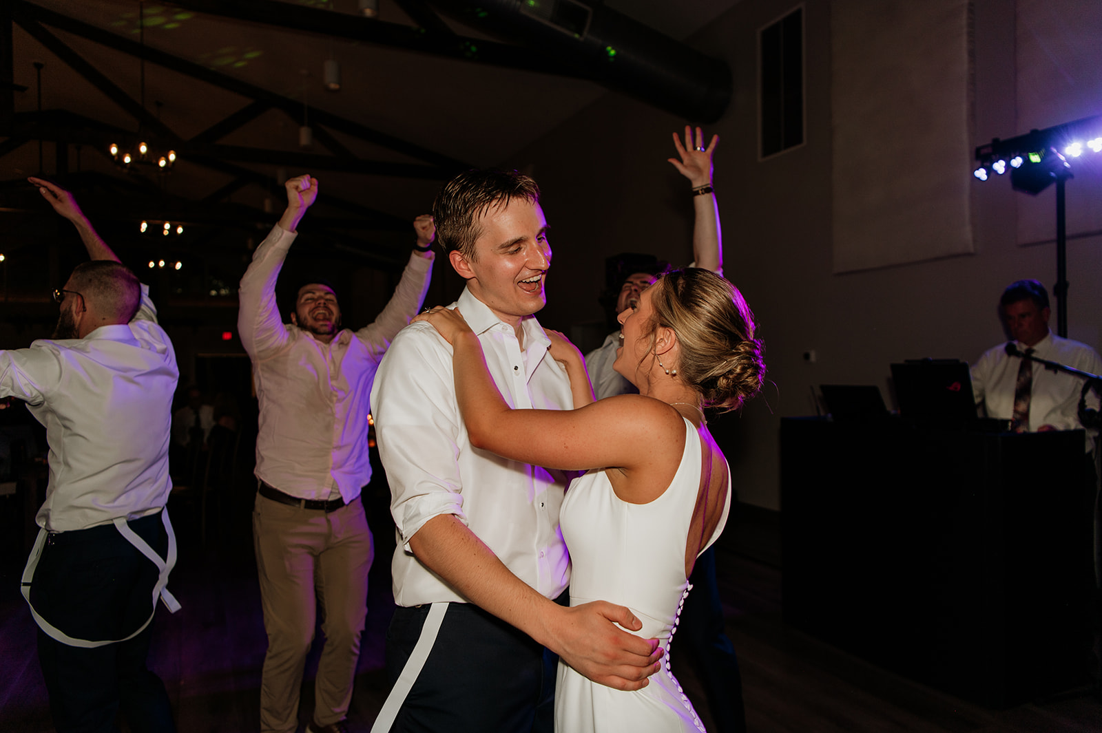 Bride and groom dancing at the end of the night