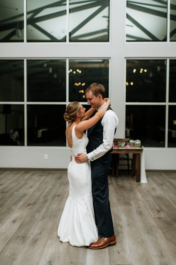 Bride and groom sharing a last private dance