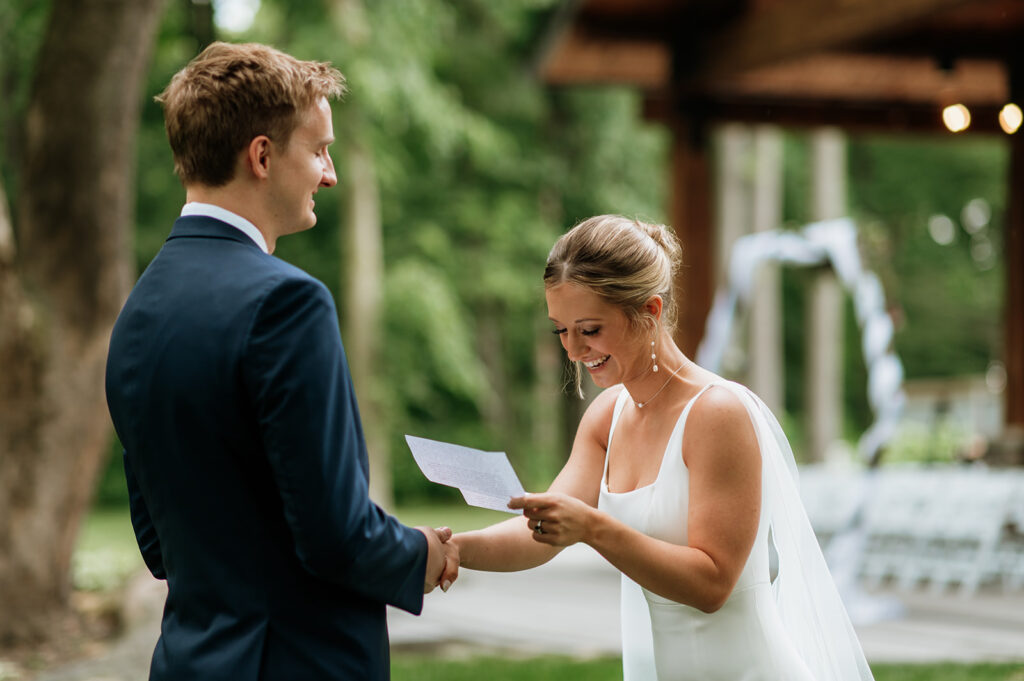 Bride reading her private vows to her groom