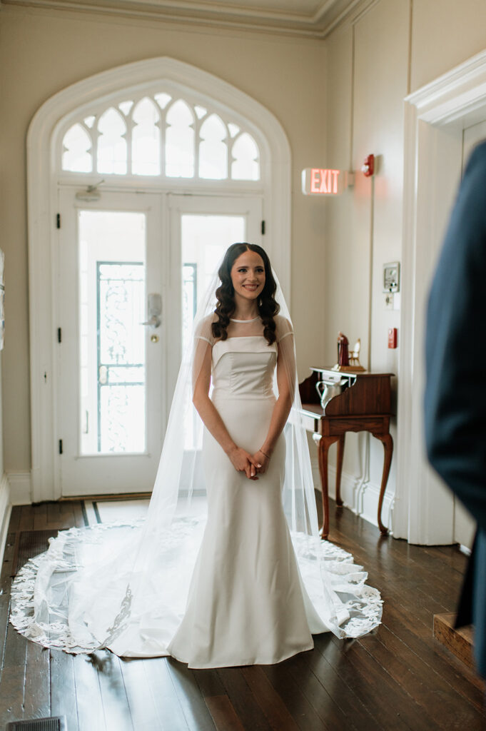 Bride about to share a first look with her father