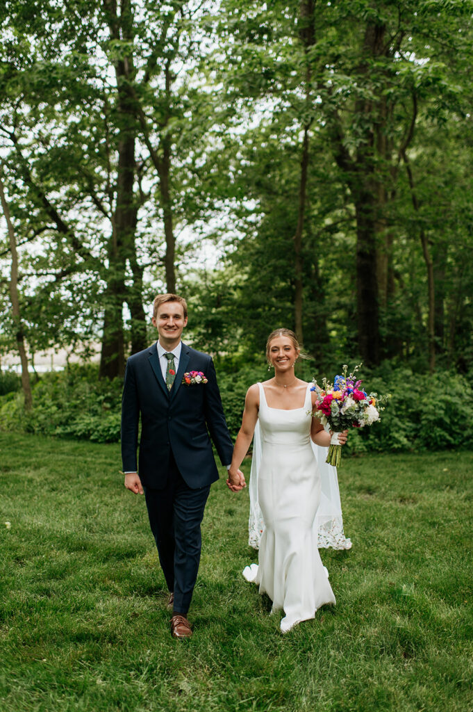 Bride and grooms outdoor wedding portraits from a colorful wildflower wedding at The Wooded Knot in Tippecanoe, Indiana