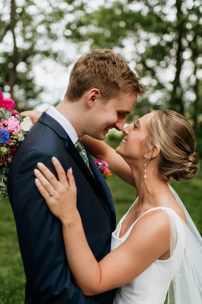 Bride and grooms outdoor wedding portraits from a colorful wildflower wedding at The Wooded Knot in Tippecanoe, Indiana