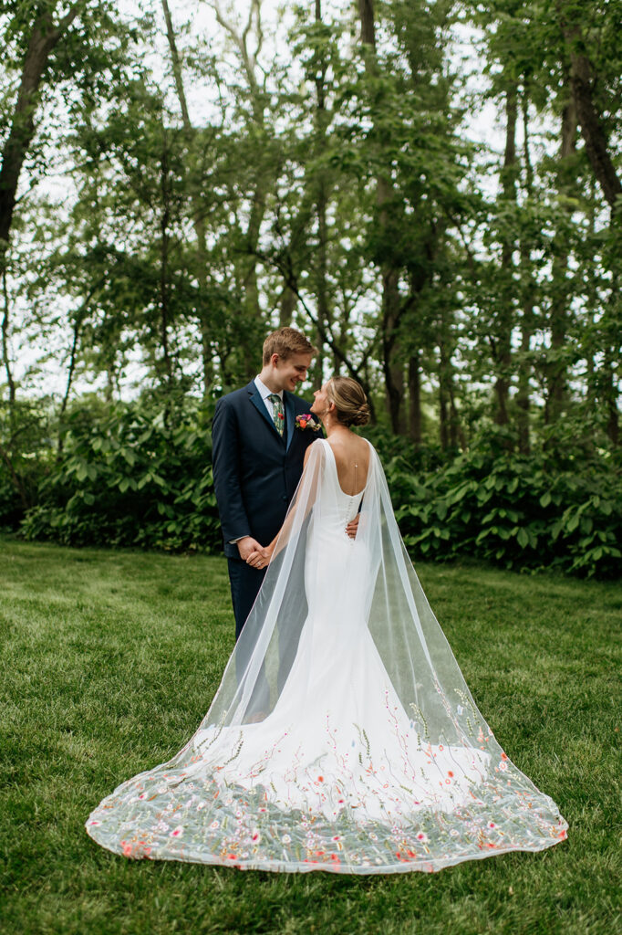 Bride and grooms outdoor wedding portraits from a colorful wildflower wedding at The Wooded Knot in Tippecanoe, Indiana