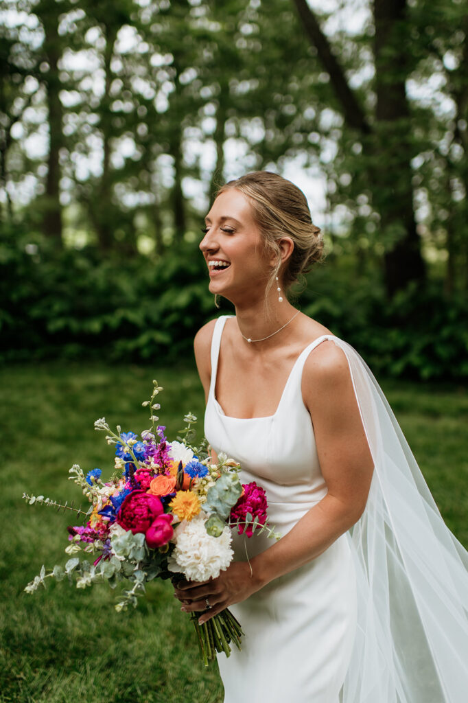 Outdoor bridal portraits from a colorful wildflower wedding at The Wooded Knot in Tippecanoe, Indiana