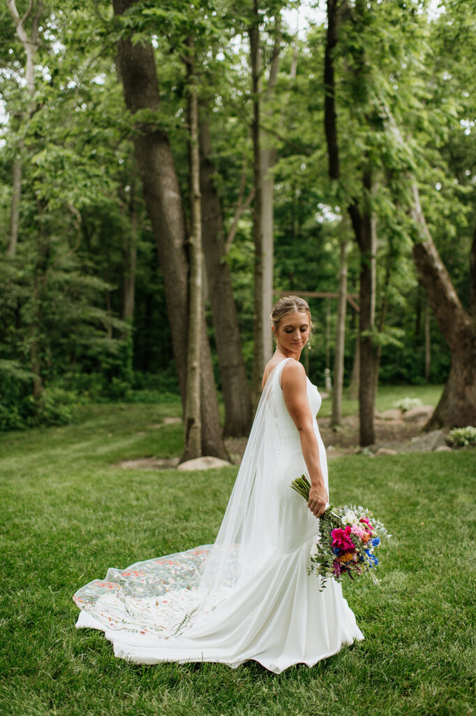 Outdoor bridal portraits from a colorful wildflower wedding at The Wooded Knot in Tippecanoe, Indiana