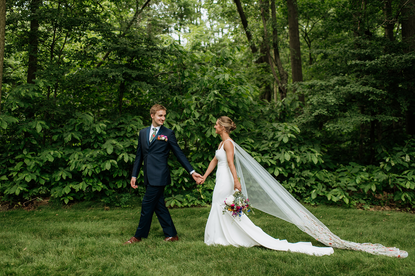 Bride and grooms outdoor wedding portraits from a colorful wildflower wedding at The Wooded Knot in Tippecanoe, Indiana