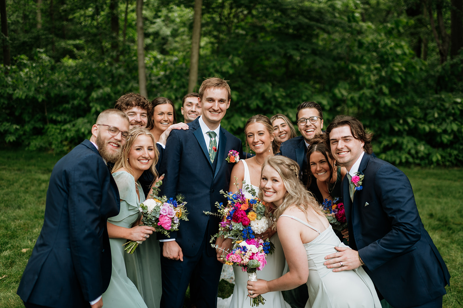 Full wedding party photo from a colorful wedding at The Wooded Knot in Tippecanoe, Indiana