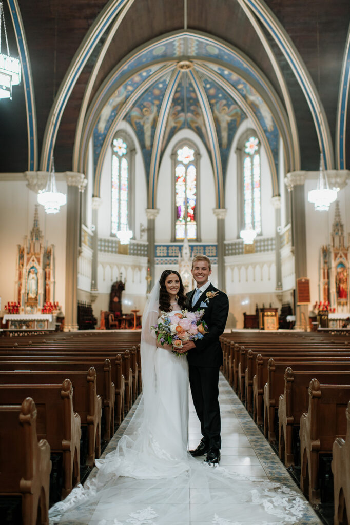 Bride and grooms portraits at St. John the Evangelist Catholic Church in Indianapolis, Indiana