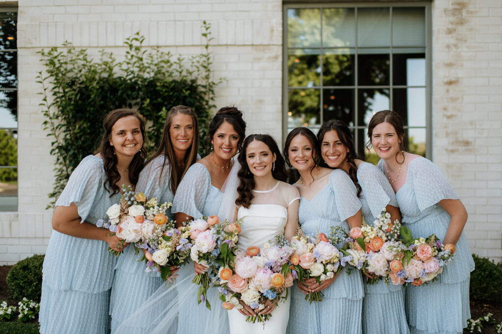 Bride and bridesmaids portraits from a summer Ritz Charles Carmel, Indiana wedding