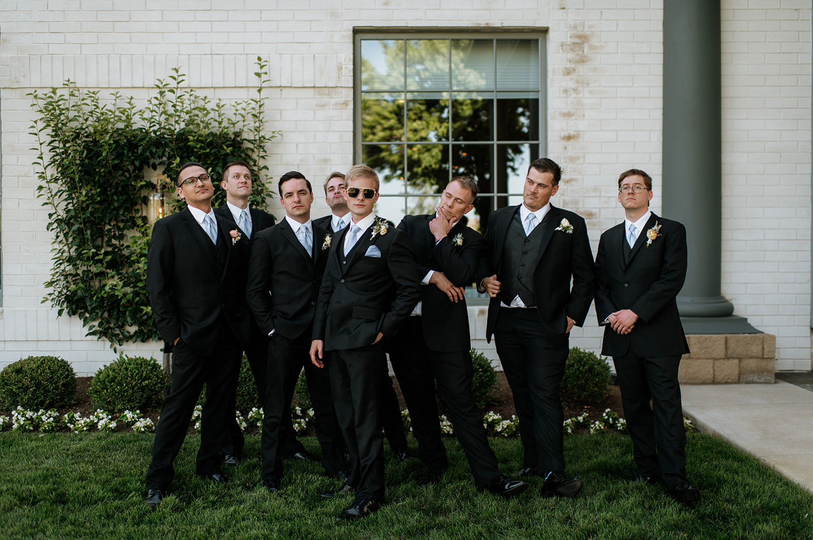 Groom and groomsmen portraits from a summer Ritz Charles Carmel, Indiana wedding