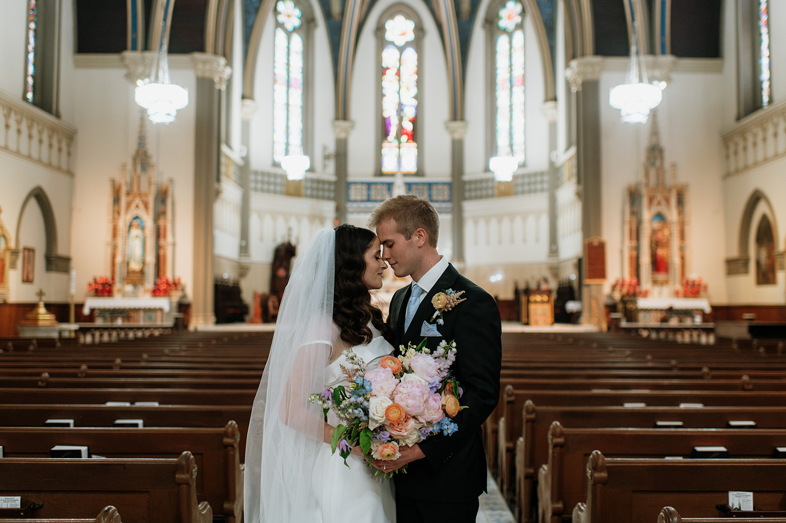 Bride and grooms portraits St. John the Evangelist Catholic Church in Indianapolis, Indiana