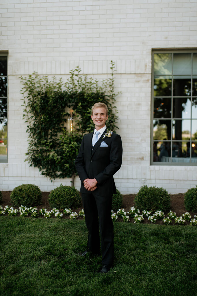 Outdoor grooms portraits from a Ritz Charles Carmel, Indiana wedding