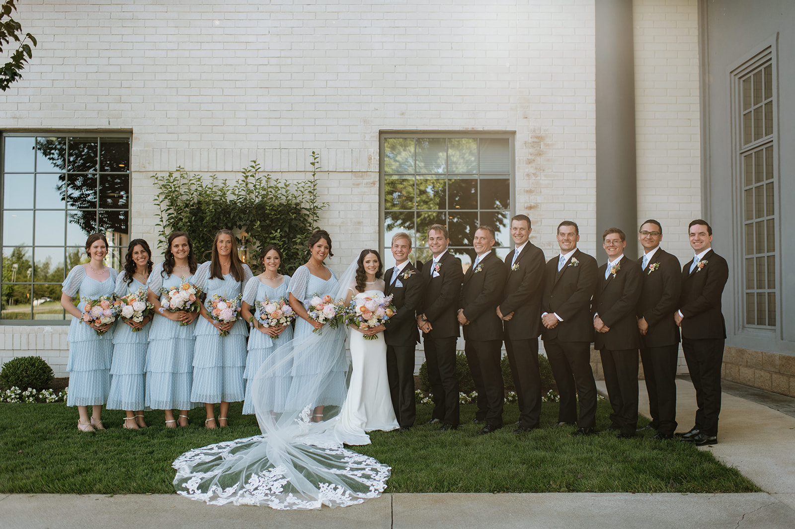 Full wedding party portraits from a summer Ritz Charles Carmel, Indiana wedding