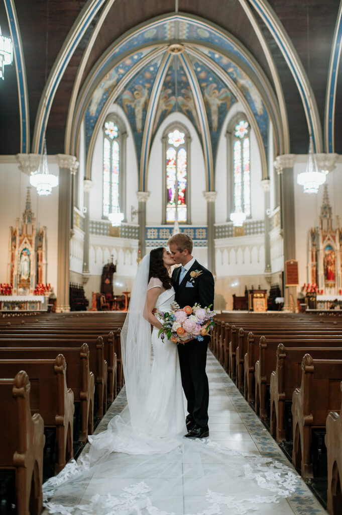 Bride and grooms portraits St. John the Evangelist Catholic Church in Indianapolis, Indiana