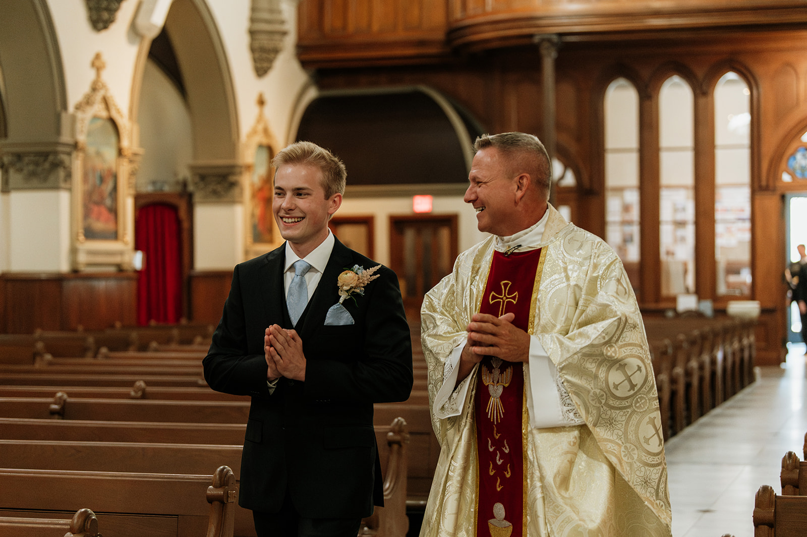 An indoor St. John the Evangelist Catholic Church wedding ceremony in Indianapolis, Indiana