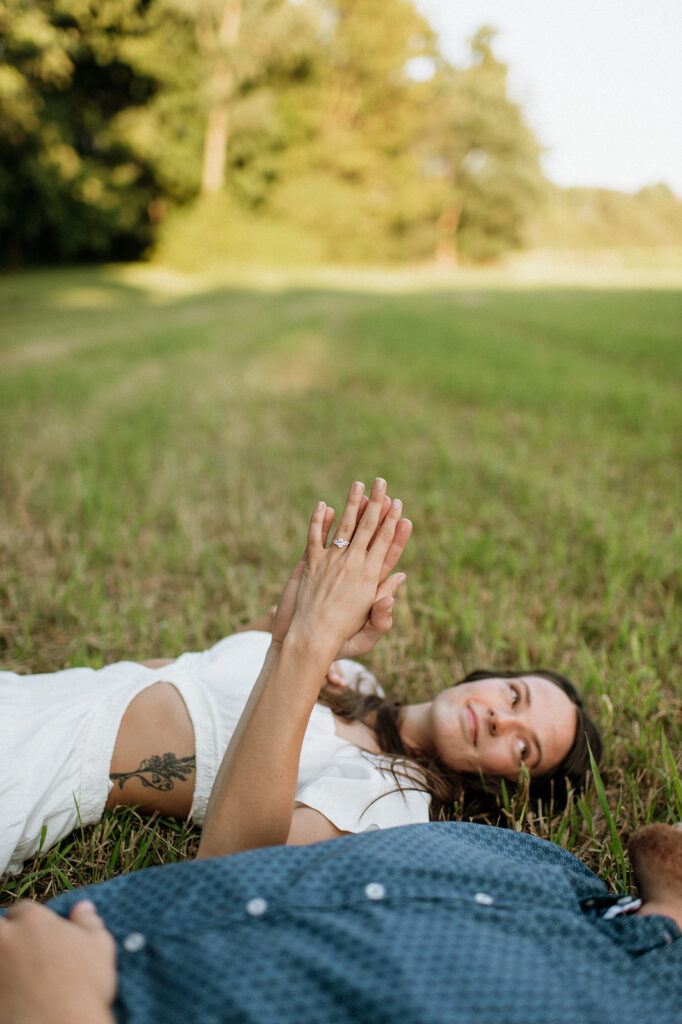 Man and woman holding hands during their Midwest engagement photos