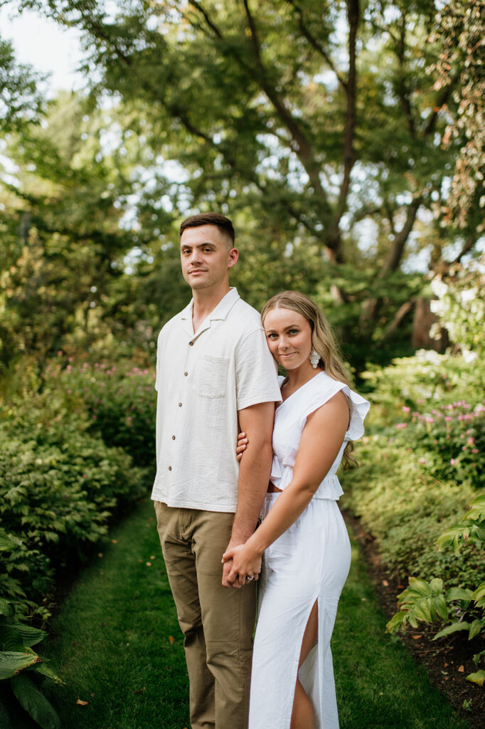 Couple posing for their garden engagement photos in Indiana