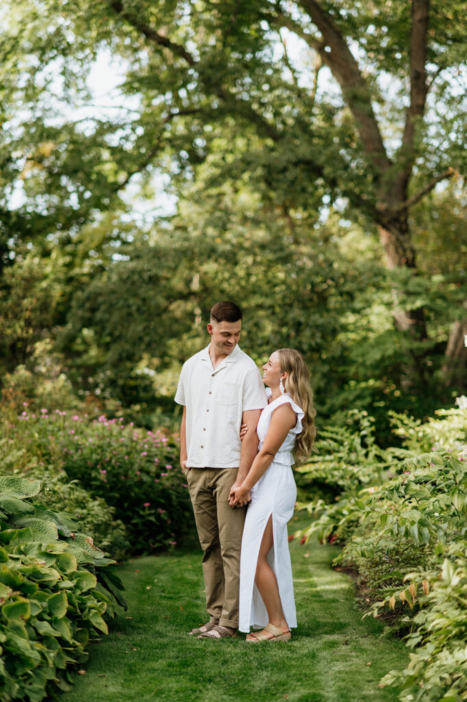 Couple posing for their garden engagement photos in Indiana