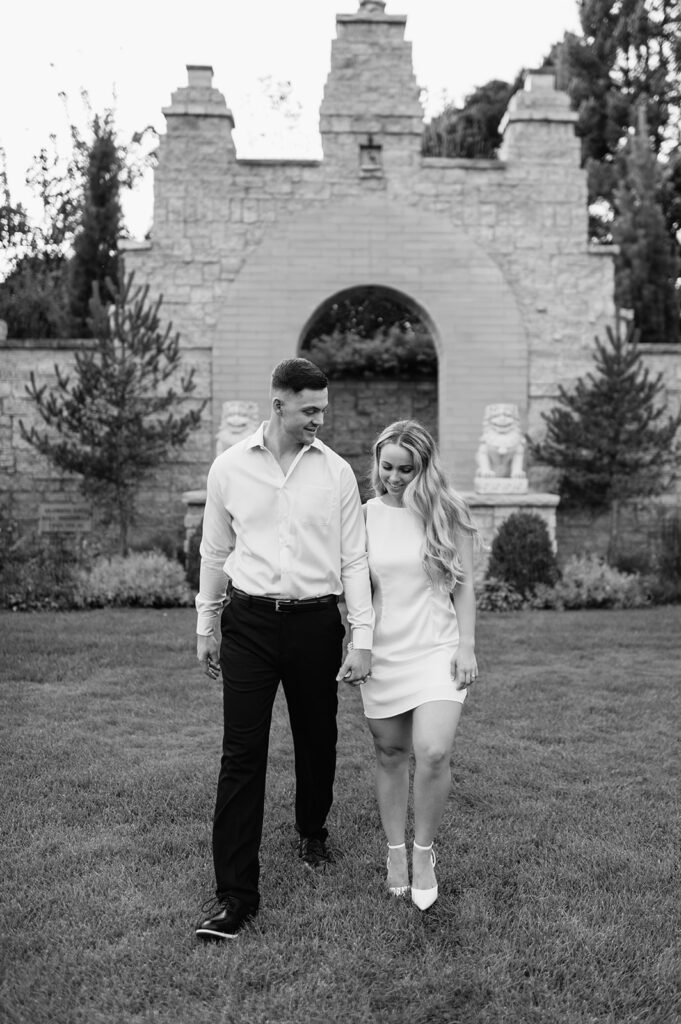 Black and white photo of a couple walking at Hamstra Gardens in Wheatfield, Indiana