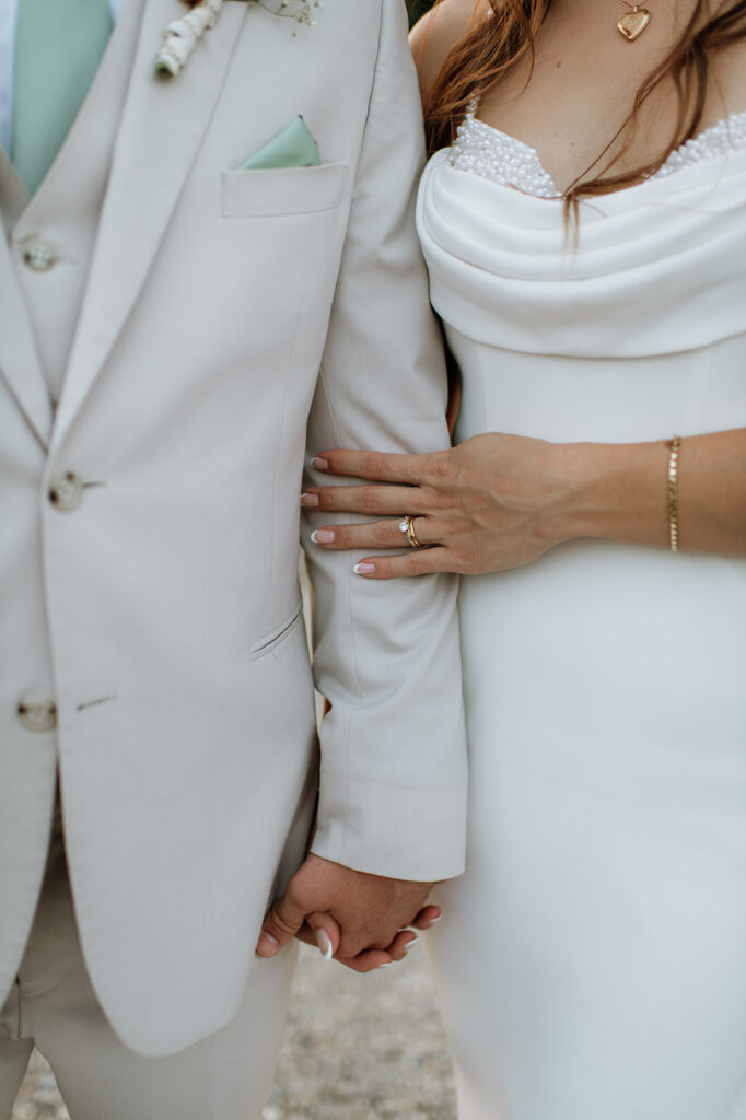 Close up shot of a bride and groom posing together