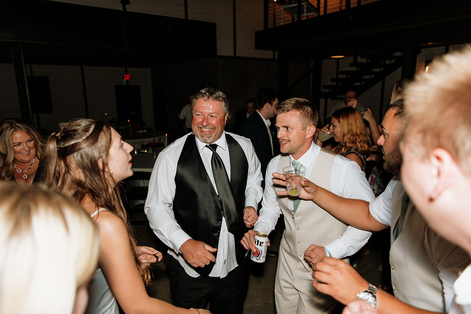 Groom dancing during the reception