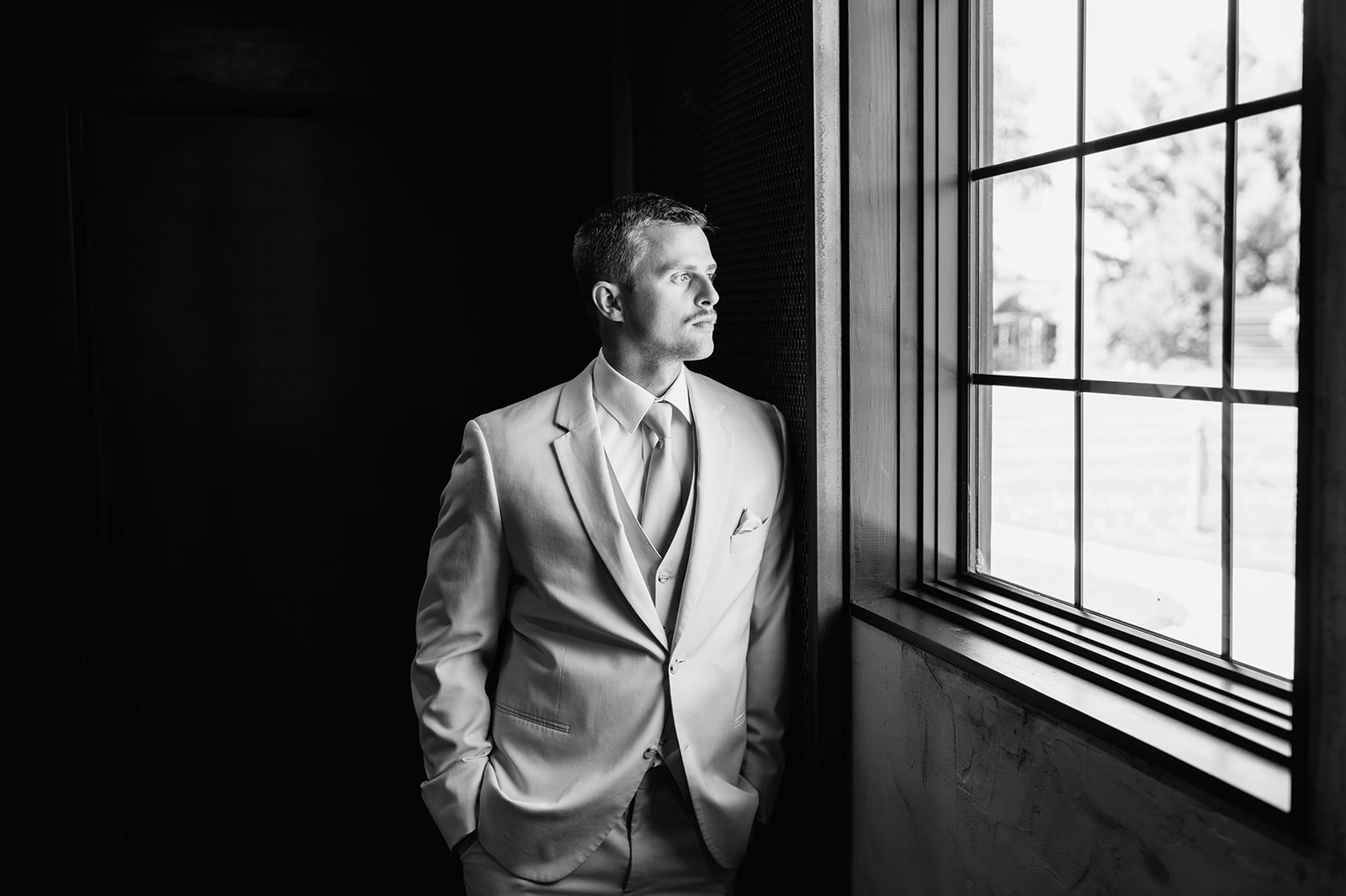 Indoor grooms portraits at Empeiria 11o wedding venue in Rochester, IN