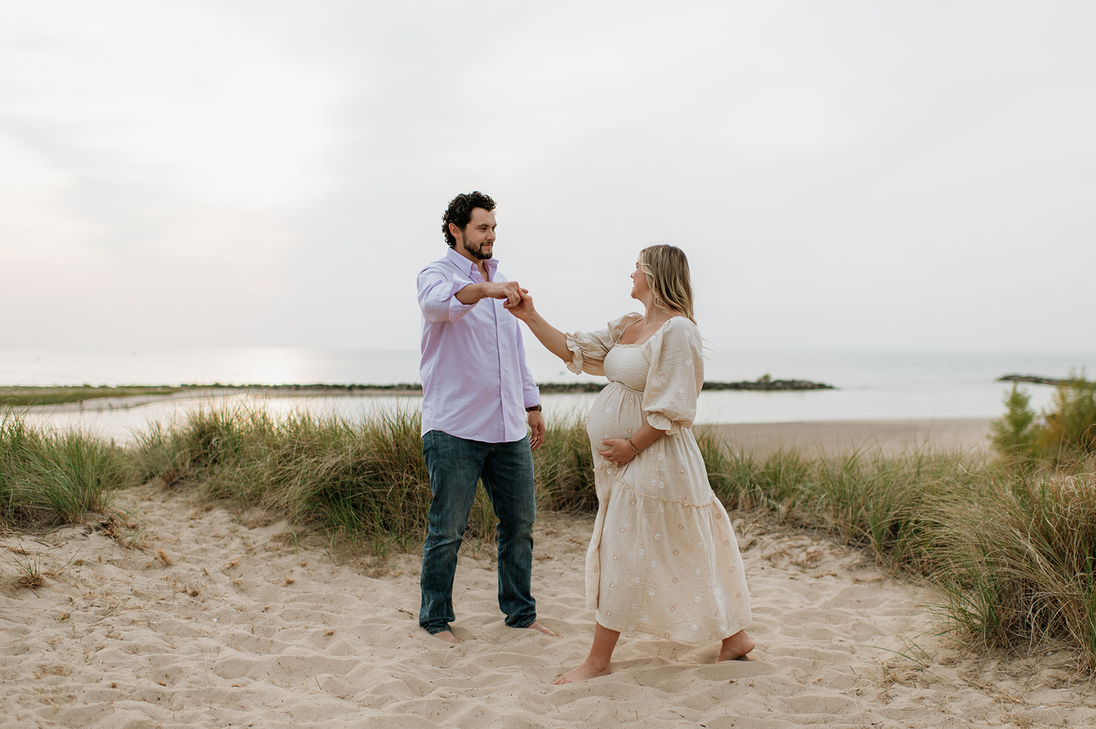 Man and woman dancing on the beach