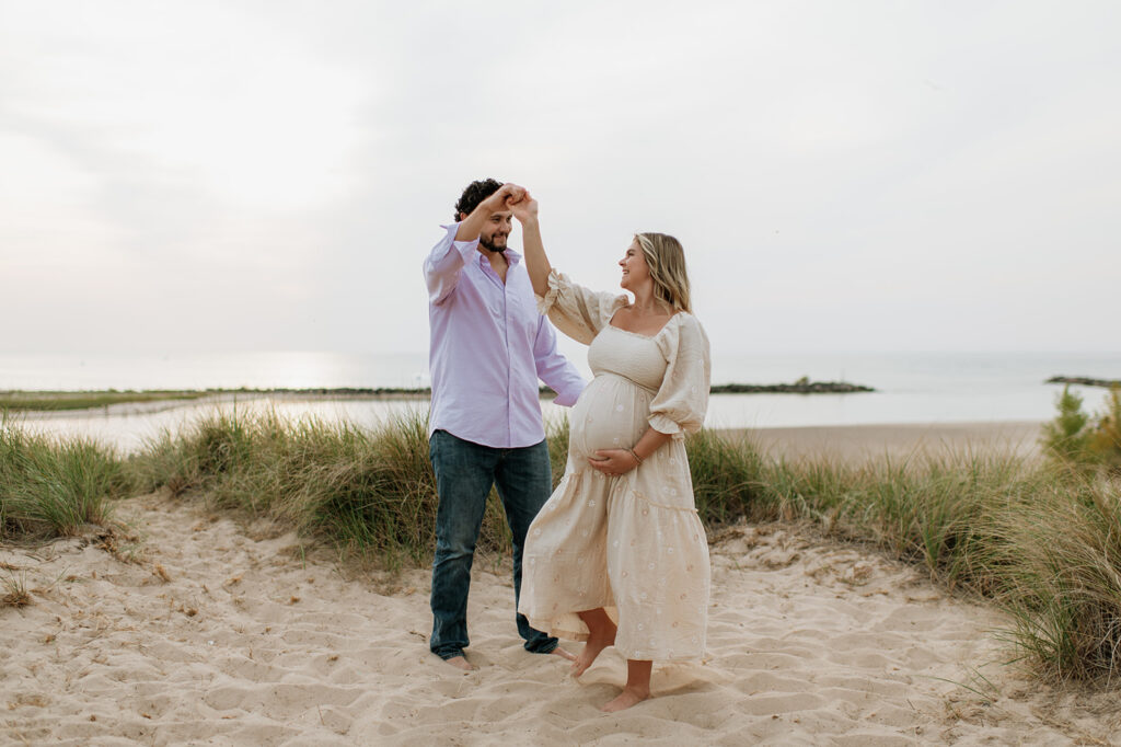 Man and woman dancing on the beach